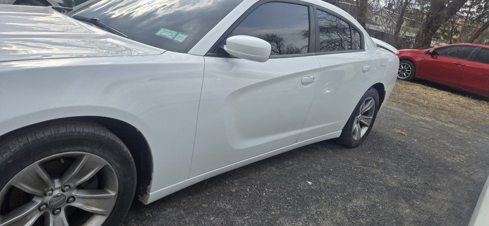 White Dodge Charger, side view, repaired in Schenectady, NY